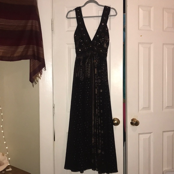 long black dress with gold accents